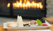 heartland hotel queenstown canapes served in front of fire place