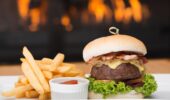 heartland hotel bar food served in front of fire place