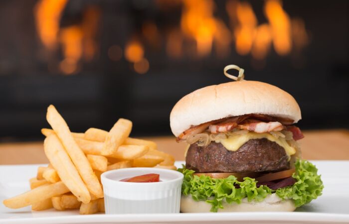 heartland hotel bar food served in front of fire place