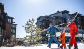 A family skiing at Deer Valley