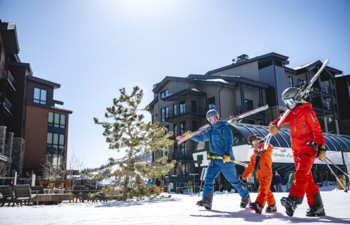 A family skiing at Deer Valley