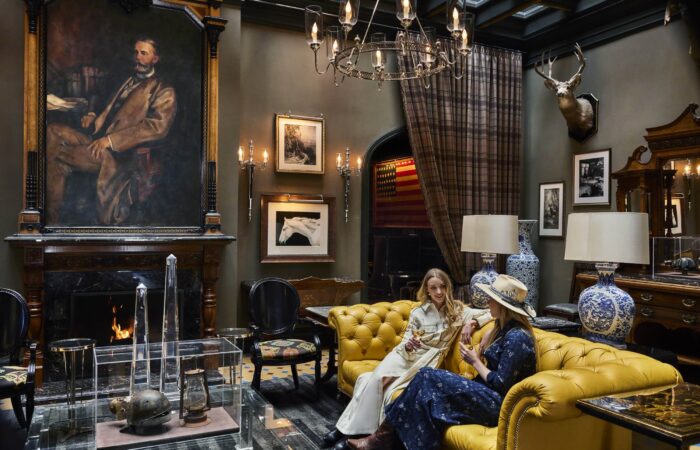 Guests enjoying the sitting area of the Hotel Jerome lobby, Aspen USA