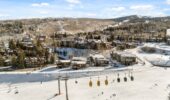Woodrun Place exterior with snow luxury ski holidays snowscene