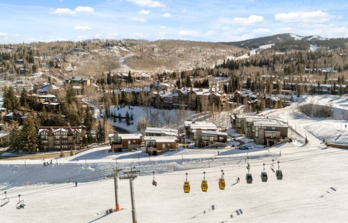Woodrun Place exterior with snow luxury ski holidays snowscene