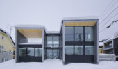 Tsu Tsu Furano self-contained accommodation exterior surrounded by snow in Furano Japan