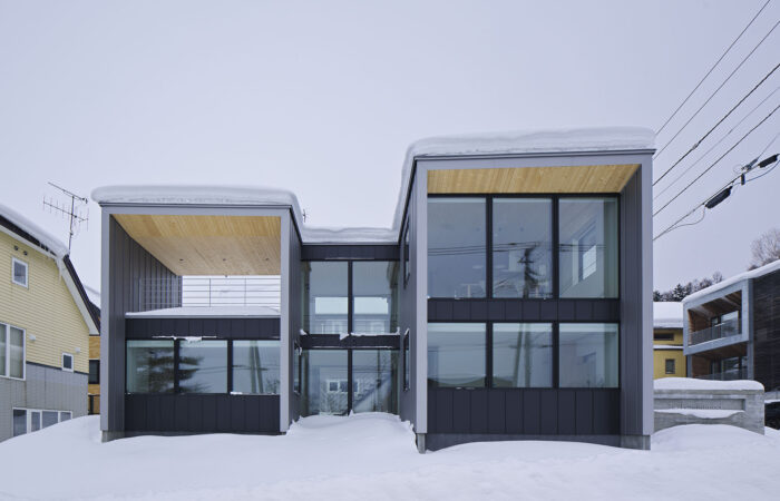 Tsu Tsu Furano self-contained accommodation exterior surrounded by snow in Furano Japan