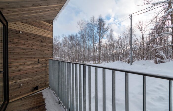 balcony view of snow from Roku Niseko self-contained accommodation in Niseko Japan