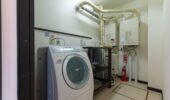 Laundry room facilities at Shochikubai accommodation in Furano Japan