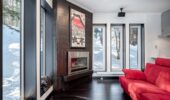 Fireplace and lounge area at Shochikubai accommodation in Furano Japan