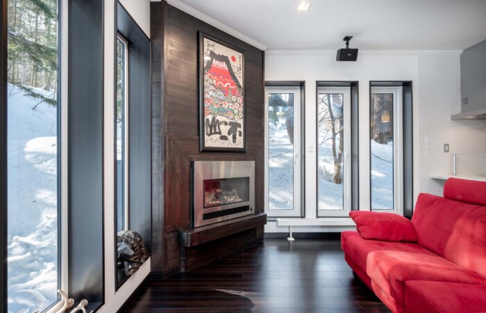 Fireplace and lounge area at Shochikubai accommodation in Furano Japan