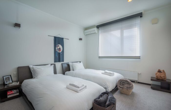 Twin bedroom at Shochikubai accommodation in Furano Japan