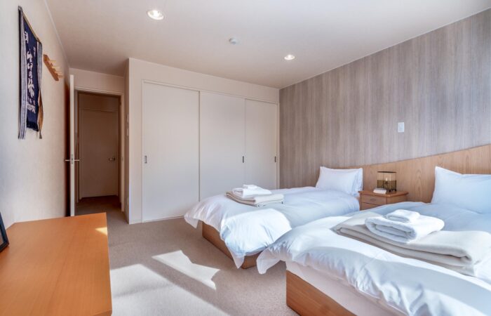Gondola Chalets self-contained accommodation Niseko bedroom Snowscene Travel Agency