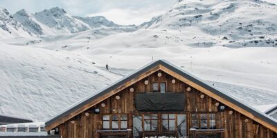 A wooden building amongst the snow at Val Thorens France