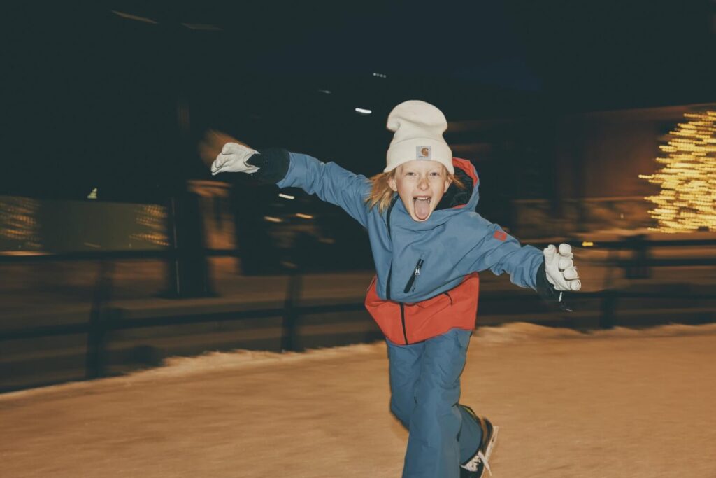 A child ice skating in Snowmass Village