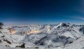 A night time view of Val Thorens amongst snow covered alps in France