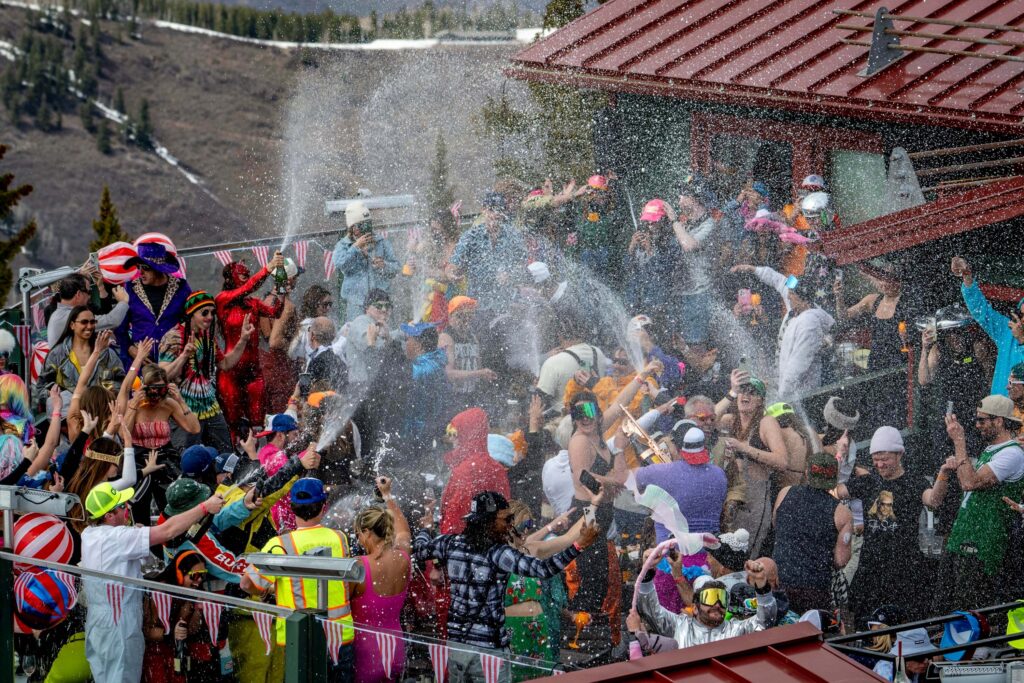 Party guests celebrating during apres ski at Cloud 9 Aspen in Aspen