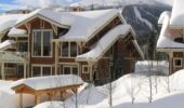 Outside view of snow covered Stone's Throw accommodation Sun Peaks in the winter