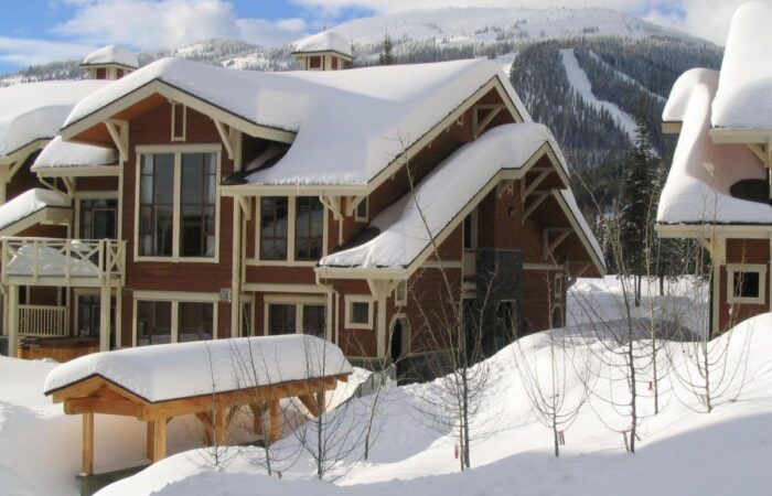 Outside view of snow covered Stone's Throw accommodation Sun Peaks in the winter