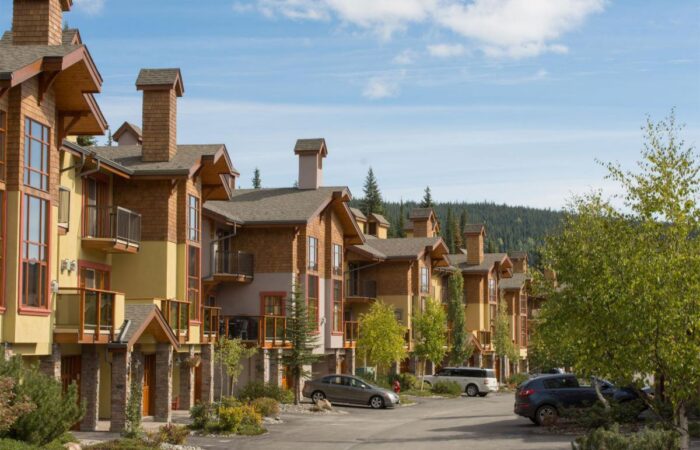 Outside view of Trail's Edge accommodation at Sun Peaks in the summer