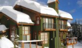 Outside view of snow covered Trail's Edge accommodation at Sun Peaks