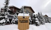 Outside view of snow covered Trapper's Landing accommodation at Sun Peaks