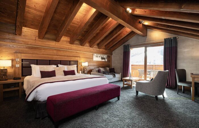 The bedroom of a studio room at Hotel Le Kaila, Meribel France