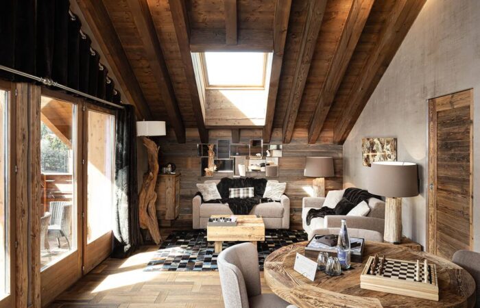 The living room in a studio room at The bedroom of a studio room at Hotel Le Kaila, Meribel France