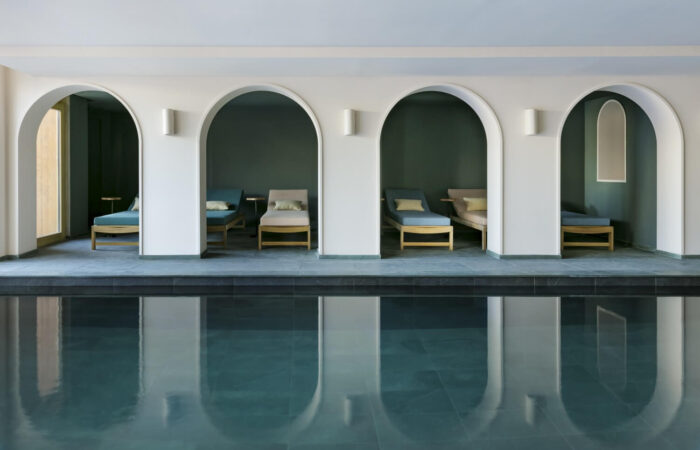 Feature arches at the indoor pool at Hotel Le Coucou Meribel France