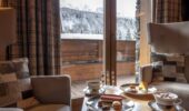 Hotel room at Hotel Le Kaila Meribel France showing a view of snow covered mountains