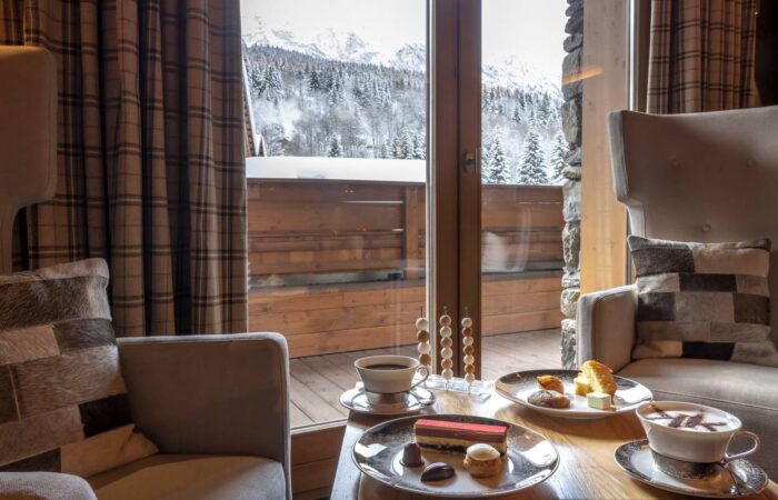 Hotel room at Hotel Le Kaila Meribel France showing a view of snow covered mountains