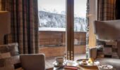 Hotel room at Hotel Le Kaila Meribel France showing a view of snow covered mountains