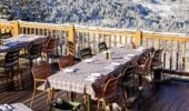 Outisde balcony dining a the Hotel Le Coucou restaurant Meribel France