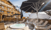 Outdoor spa area of Hotel Le Mottaret Mirabel France