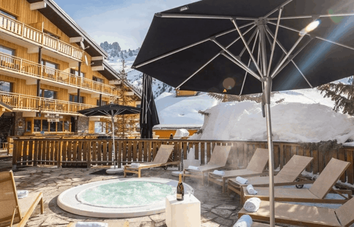Outdoor spa area of Hotel Le Mottaret Mirabel France