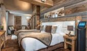 A luxury bedroom at Hotel Le Kaila, Meribel France