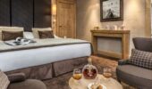 A luxury bedrrom at Hotel Le Kaila, Meribel France