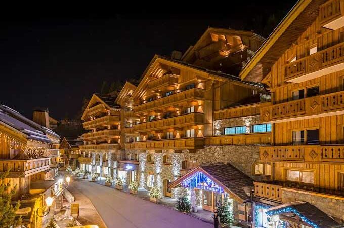 A night time shot of the exterior of Hotel Le Kaila Meribel France
