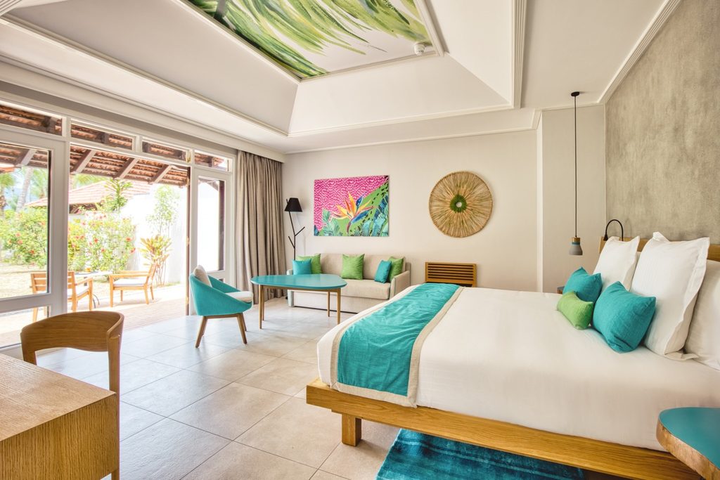 Club Med Seychelles view of resort room with bed and living area