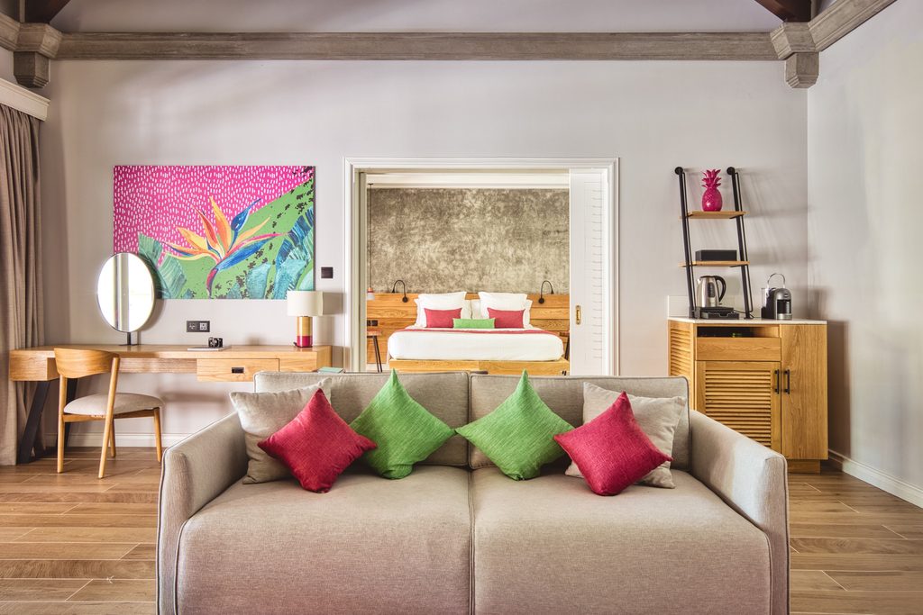 Club Med Seychelles view of resort room with bed and living area