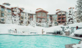 The Village Lodge Mammoth exterior view with outdoor swimming pool