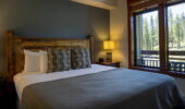 Bedroom view with a large bed at The Village Lodge Mammoth