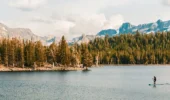 A paddle boarder on the lake at Mammoth Ski Resort