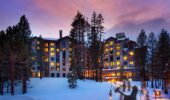 An exterior view of the Westin Monache Mammoth in winter at sunset