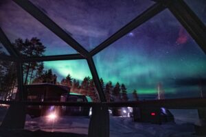 A view to the northern sky through a glass igloo in Finland